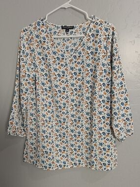 Mario Serrani White Floral V-Neck Blouse with Blue and Rust Accents